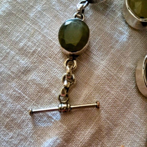 Silver bracelet with genuine green stones, like new
