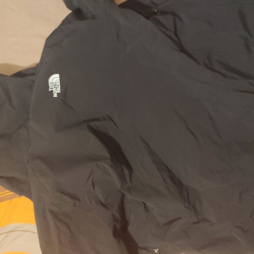 The North Face waterproof windbreaker jacket used, size large, black