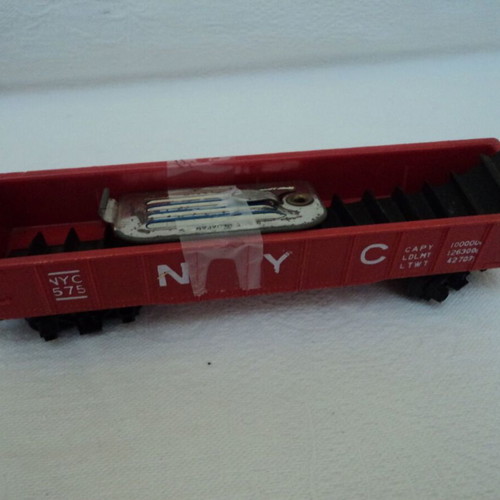 Train set used, engine with three wagons and tracks made in Japan