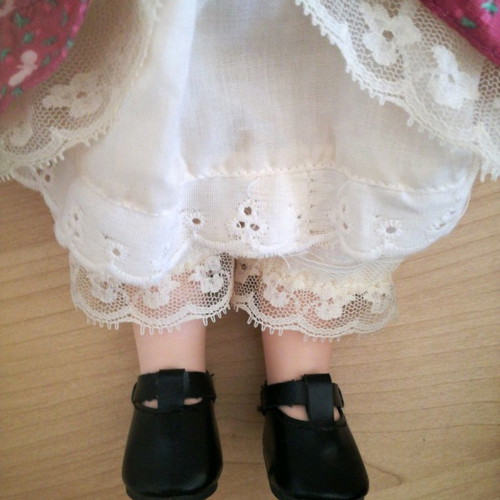 Porcelain doll used, 38cm tall with clothes and shoes
