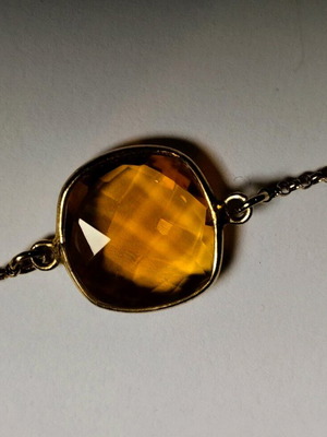 Bracelet like new with yellow stone