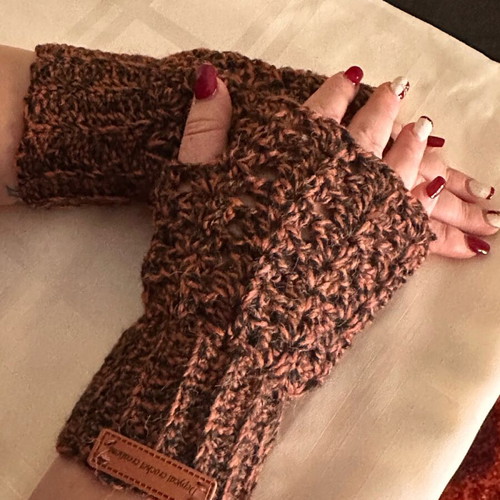 Handmade knitted set scarf, hat and gloves brown