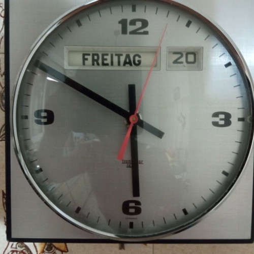 Vintage wall clock with date