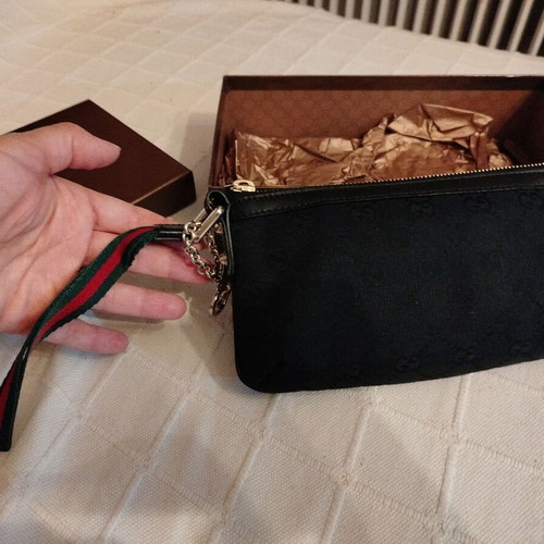 Gucci fabric wrist pouch like new, black