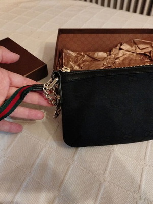 Gucci fabric wrist pouch like new, black