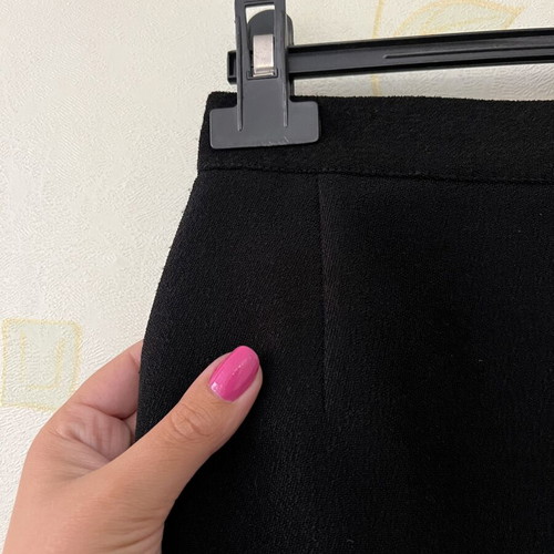 A-Style black skirt with zipper and button, knee-length, new