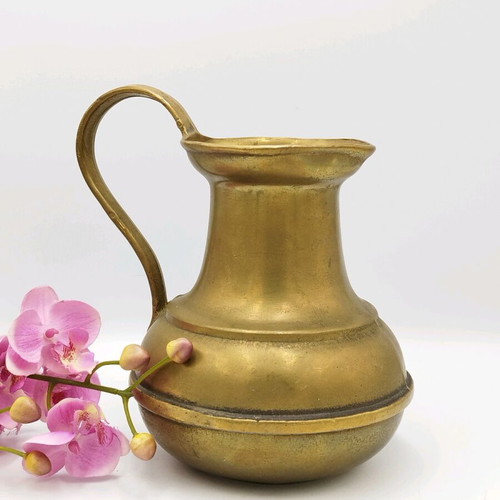Old bronze pitcher used, vintage vase