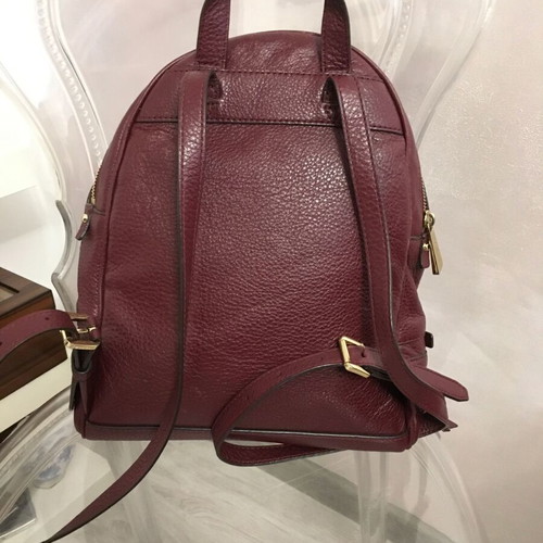 Michael Kors genuine leather backpack used, red