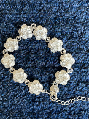 Silver-plated bracelet with rose motifs new, silver color