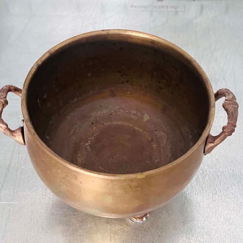 Vintage brass planter with lion claw feet used