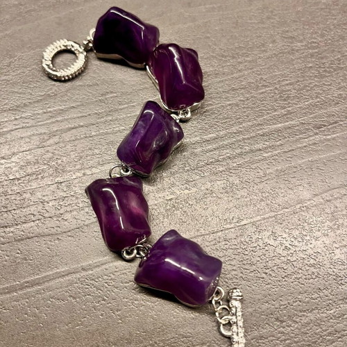 Bracelet like new with large amethyst resin stones purple