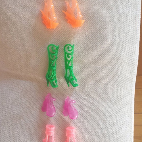 Doll shoes like new, pack of 4 pairs