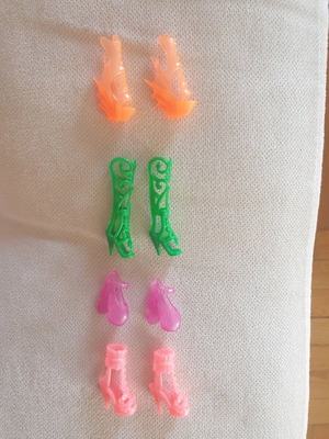 Doll shoes like new, pack of 4 pairs