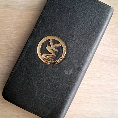 Michael Kors wallet used, black with gold monogram
