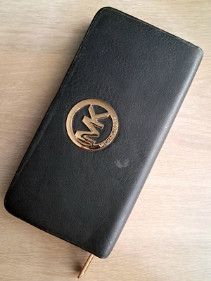 Michael Kors wallet used, black with gold monogram