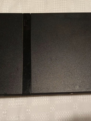 Sony PlayStation 2 Slim like new with cables and controllers