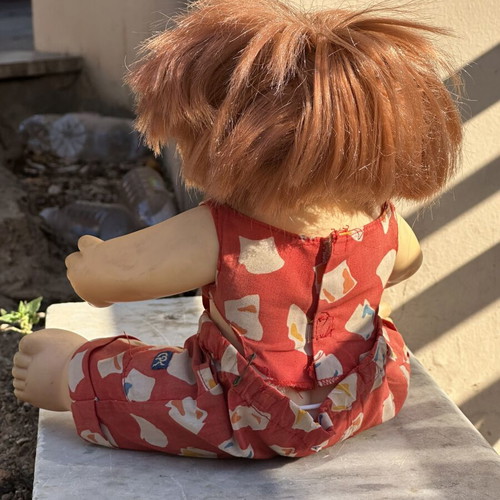 Vintage Cabbage Patch Kids doll used with clothes