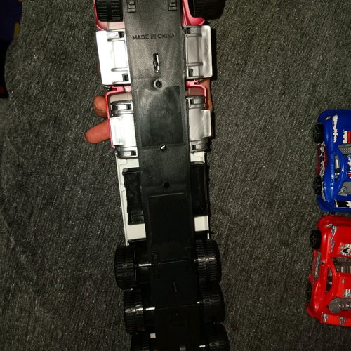 Toy truck like new with two toy cars