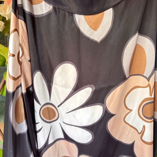 Women's skirt knee-length, airy, flared, like new, with large floral print