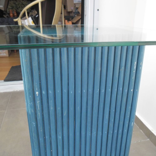 Console table used with 2 blue/navy bases and glass top