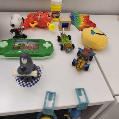 Various toys used, bubble bottle empty