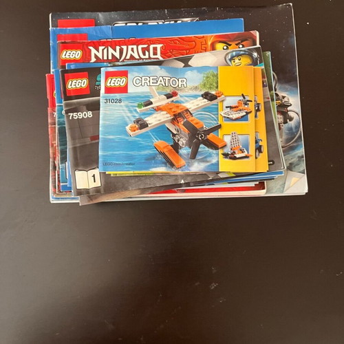 Lego Ninjago manuals and more used, pack of 15 pieces