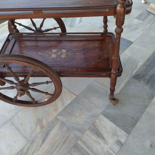 Wooden bar trolley with copper leaf design used