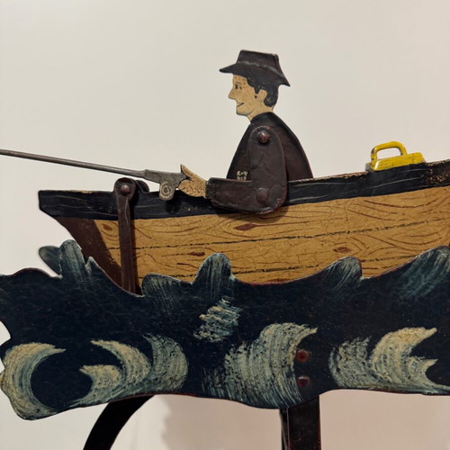 Vintage style folk art pendulum with fisherman in boat used