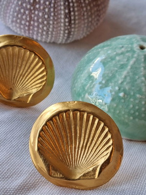 Vintage earrings in shell shape used