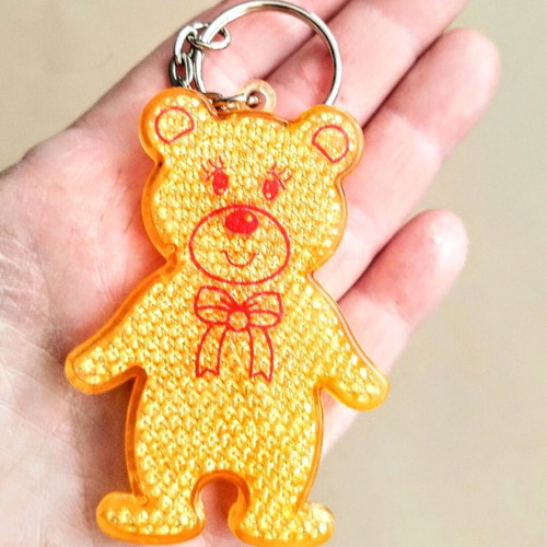 Reflective keychain Bear like new, yellow and orange