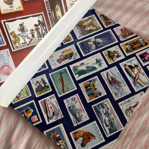 Stamp album like new, including Athens 2004 Olympic Games series