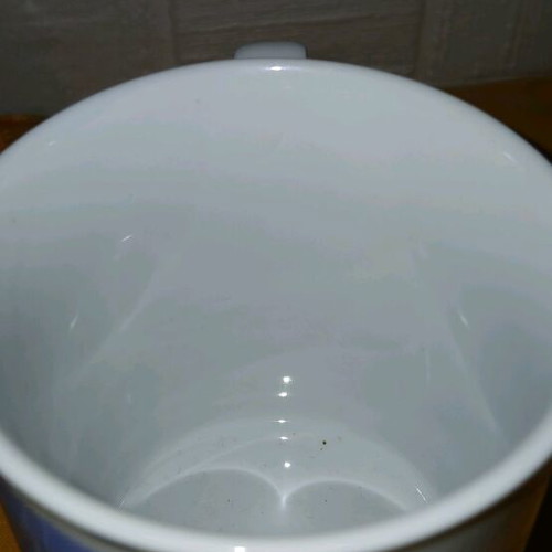 Mask mug used, rare 1980s with crack on handle
