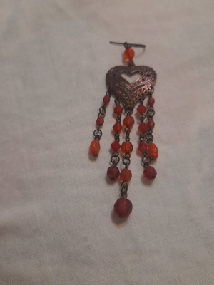 Single earring matching bracelet