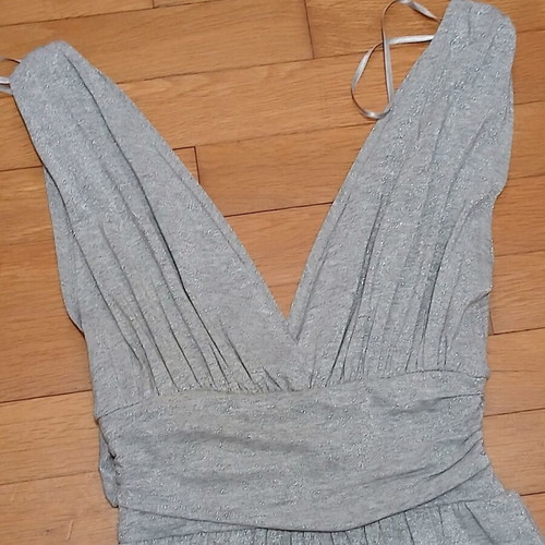 Dress gray silver with V neckline and bow tie at waist size Medium like new