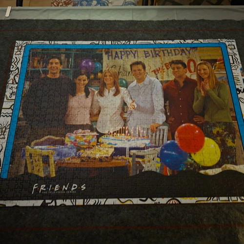 Puzzle Friends 1000 pieces like new with large collectible poster