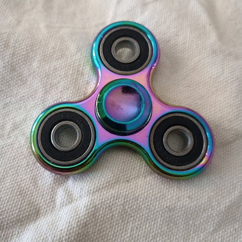 Fidget toy iridescent metal like new