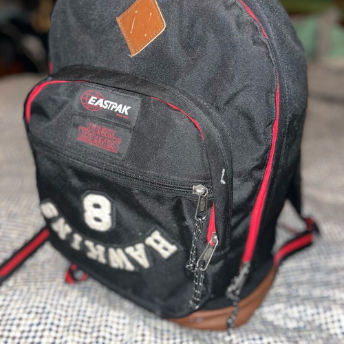 Eastpak Stranger Things backpack used, black with stain