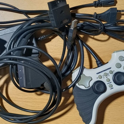 PlayStation 2 Slim used with adjusted laser and functional controller