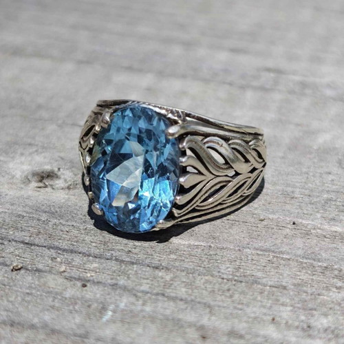 Silver ring with blue topaz new, size 7.5