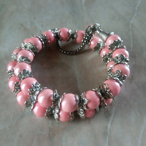 Handmade pink bracelet with beads and silver tones new