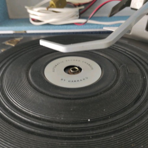 Old turntable used, functional with needle, speaker issues
