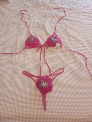 Sexy lingerie new, size up to small, fuchsia with real feathers
