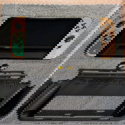 Nintendo Switch OLED Zelda Edition като нов с запечатани аксесоари