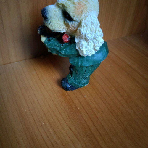 Decorative dog figure with saxophone like new