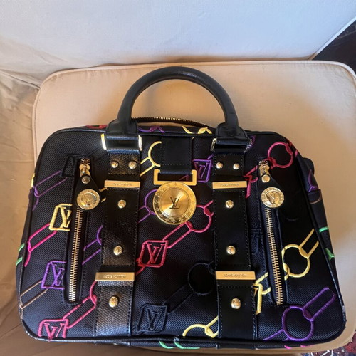 Black shoulder bag with colorful embroidery, like new