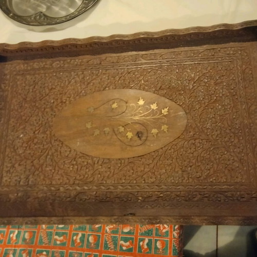 Carved wooden tray used with brass inlay