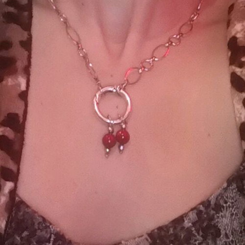 Steel necklace used, red and silver