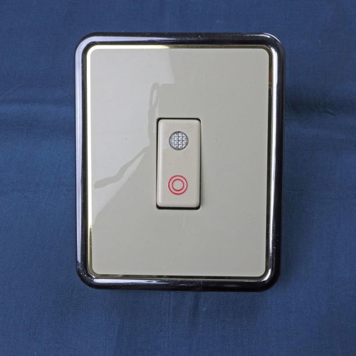 Old-style doorbell button new, illuminated