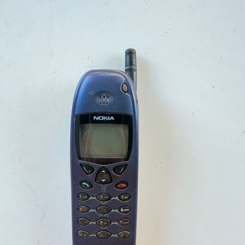 Nokia 6110 and 6103 vintage mobile phones used with chargers