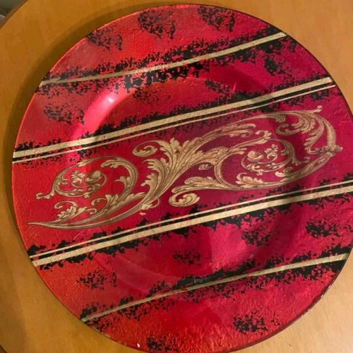 Decorative charger plate like new with embossed gold baroque designs